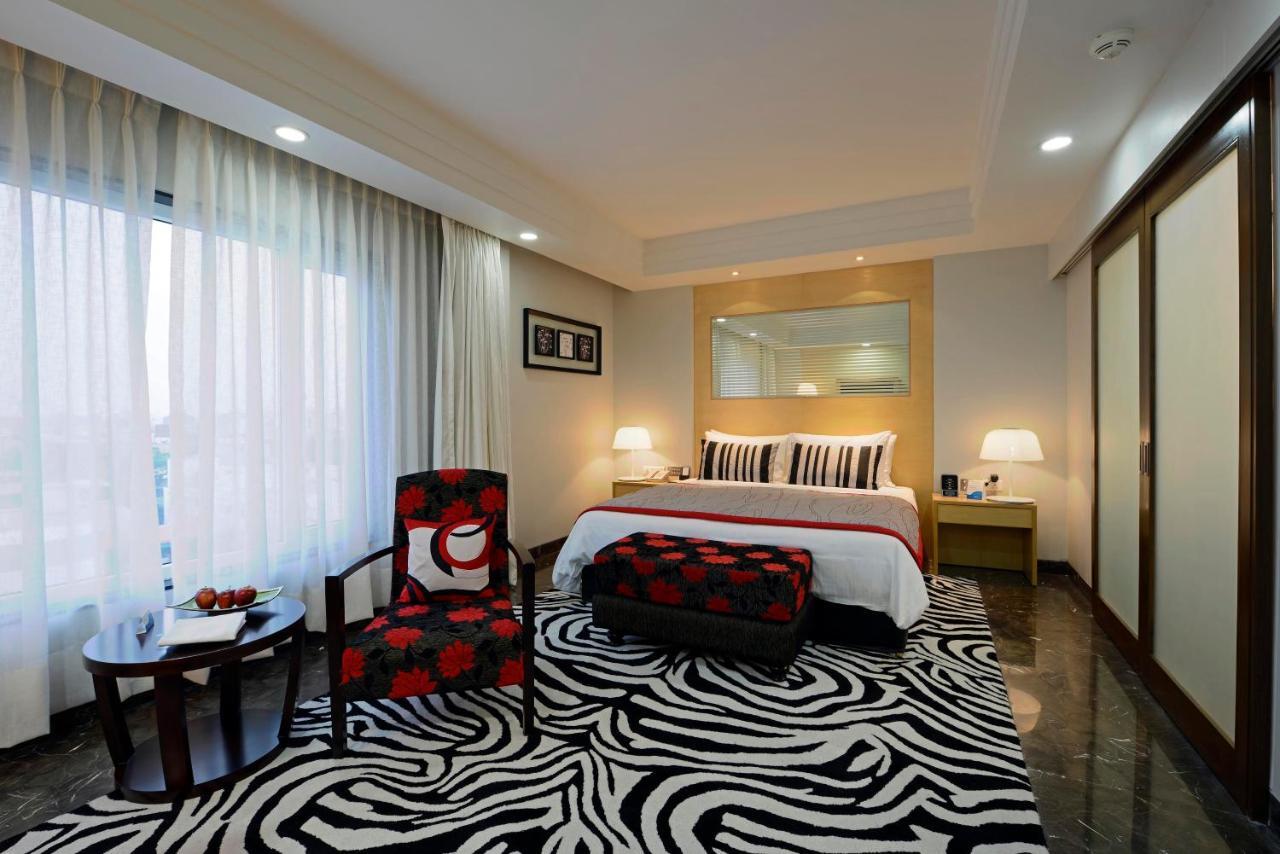 Radisson Blu Hotel Ахмедабад Номер фото A room at the Taj Bengal